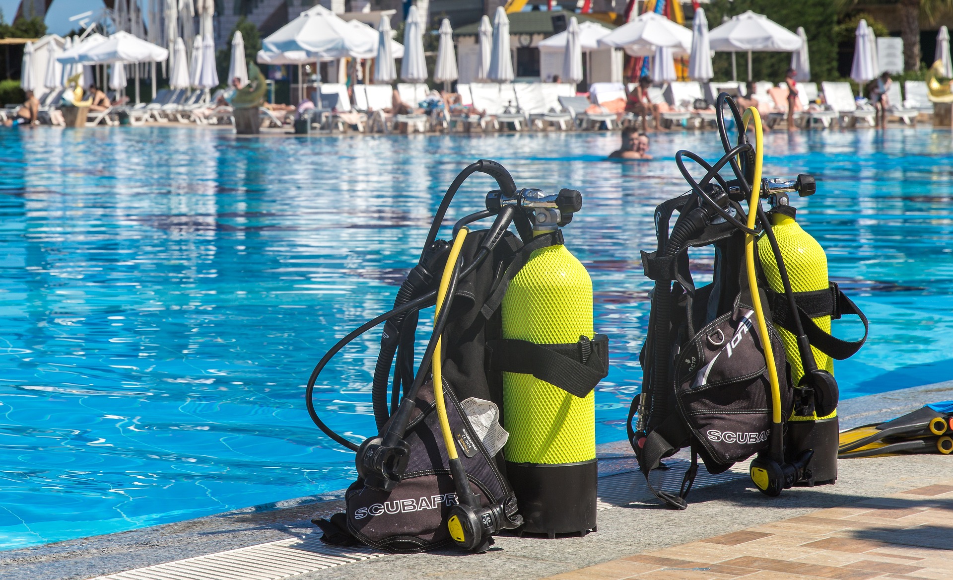 Two sets dive gear poolside